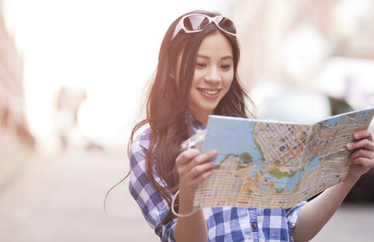 Chinese woman looking at map